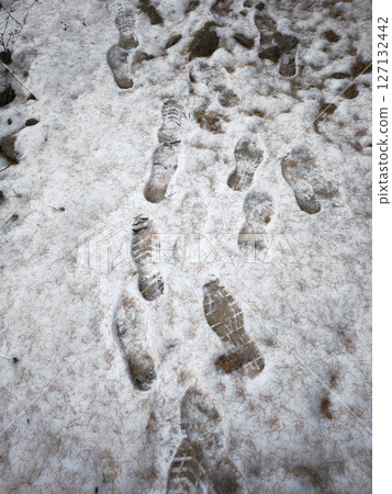 Footprints lead through a snow covered path in aosta, italy, capturing the serene beauty of a winter landscape in november Lillaz Footprints lead through a snow covered path in aosta, italy, capturing the serene beauty of a winter landscape in november Lillaz 127132442