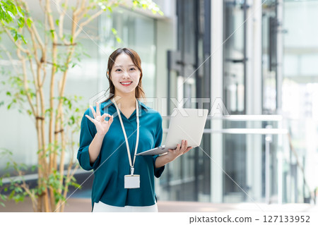 A young female engineer working in an office. Photo courtesy of Sky Perfect Tokyo Media Center. 127133952