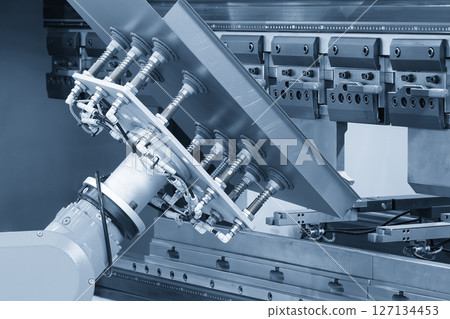 High technology bending machine operation with robotic system in the light blue scene. 127134453