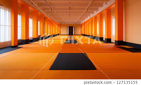 A long corridor with orange walls and black and orange flooring creates a striking minimalist design A long corridor with orange walls and black and orange flooring creates a striking minimalist design 127135155