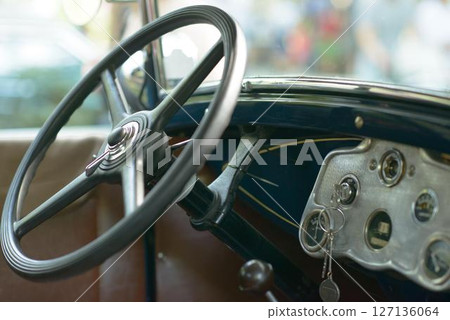 Steering Wheel and Dashboard of Vintage Car 127136064