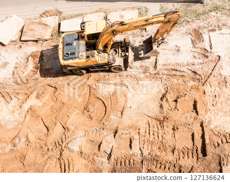 Hyundai excavator. The Architecture backgrounds and objects. Home construction. Hyundai excavator. The Architecture backgrounds and objects. Home construction. 127136624