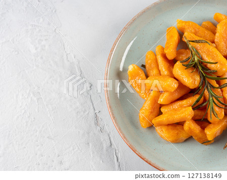 Pumpkin recipe homemade gnocchi on pastel color background 127138149