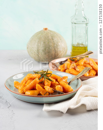 Pumpkin recipe homemade gnocchi on pastel color background 127138150