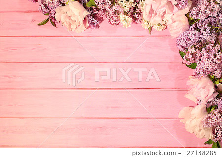 Abstract floral composition and banner for screen, Beautiful spring blooming branches of lilac and mountain peony on sunny background. Still life with place for text, Floral holiday card Abstract floral composition and banner for screen, Beautiful spring blooming branches of lilac and mountain peony on sunny background. Still life with place for text, Floral holiday card 127138285