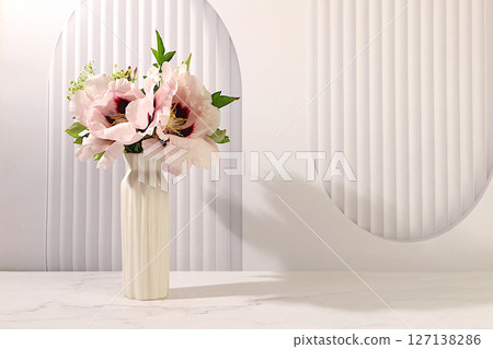 Still life with spring flowers mountain peony in vase on elegant modern table,template for your design with space for text,minimal beauty concept,beautiful flower card,abstract flower arrangement. Still life with spring flowers mountain peony in vase on elegant modern table,template for your design with space for text,minimal beauty concept,beautiful flower card,abstract flower arrangement. 127138286