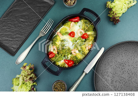 Freshly baked broccoli and prawns. 127138408