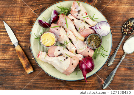 Group of raw chicken legs. Group of raw chicken legs. 127138420