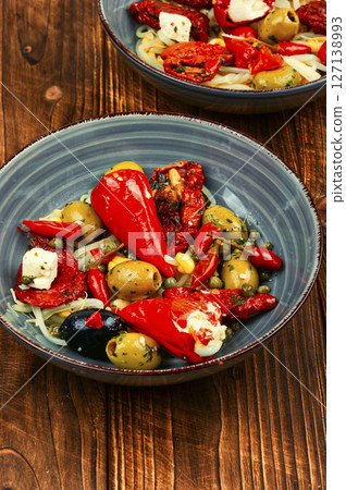 Salad of preserved soy sprouts and pickled vegetables. 127138993