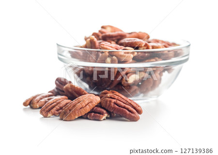 Peeled pecan nuts  isolated on white background. 127139386