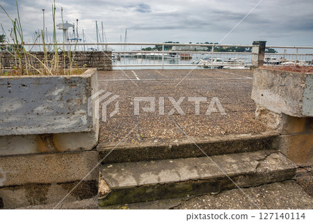 Old Concrete Steps Overlooking Porec Marina in Istria, Croatia. 127140114