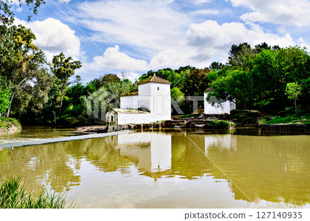 San Juan flour mill, next to the banks of the Guadaira River, within Oromana Park in Alcala de Guadaira, Seville San Juan flour mill, next to the banks of the Guadaira River, within Oromana Park in Alcala de Guadaira, Seville 127140935