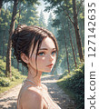 Woman walking in the forest 127142635