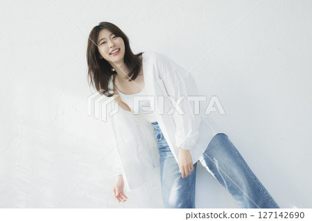 A woman in a white shirt 127142690