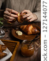 Table photo with croissants 127144077