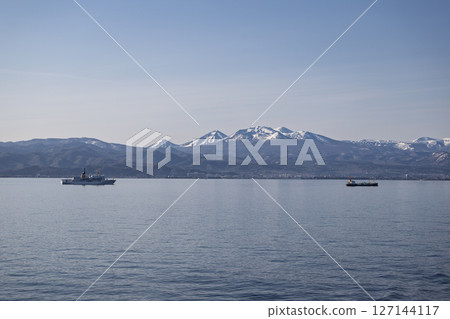 Aomori city center and Hakkoda seen from the sea 03 127144117