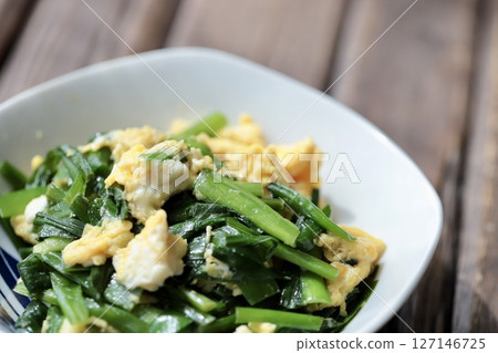 Fluffy eggs stir-fried with chives and egg Fluffy eggs stir-fried with chives and egg 127146725