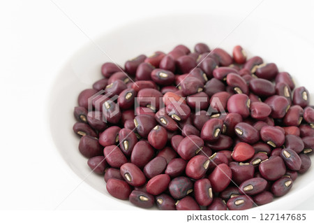Offerings in a plate 127147685