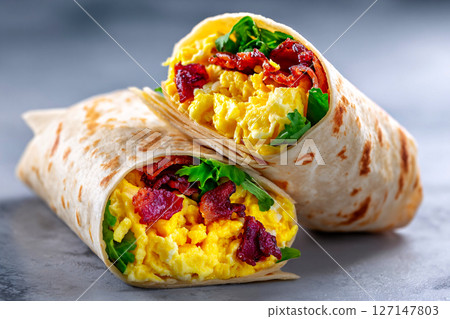 Tempting burrito glows in studio light, set in an industrial corner on pale gray background 127147803