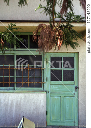 Old wooden door of an old house Old wooden door of an old house 127148990