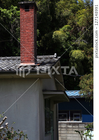House with a chimney House with a chimney 127148991