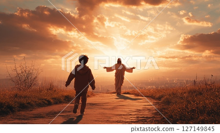 Joyful boy runs along picturesque road in a field towards a figure symbolizing hope and faith 127149845