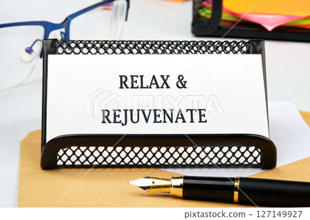 The conceptual phrase RELAX AND REJUVENATE. The concept of beauty and health. concept Relax, restore, refresh 127149927