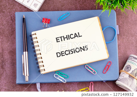 A conceptual phrase on the topic of ETHICAL DECISIONS business. AI ethics or AI Law concept. A conceptual phrase on the topic of ETHICAL DECISIONS business. AI ethics or AI Law concept. 127149932