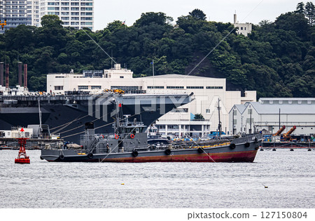 A Maritime Self-Defense Force oil tanker sailing in the naval base bay at Nagaura Port in Yokosuka City, Kanagawa Prefecture 127150804