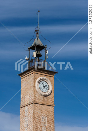 Clock tower in the square of Spain in the old town of Consuegra, Toledo Clock tower in the square of Spain in the old town of Consuegra, Toledo 127152053
