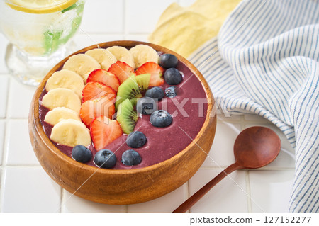 Banana and strawberry acai bowl 127152277
