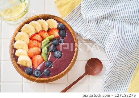 Banana and strawberry acai bowl 127152279