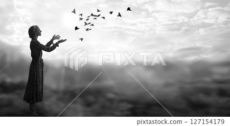 Young girl praying to God 127154179