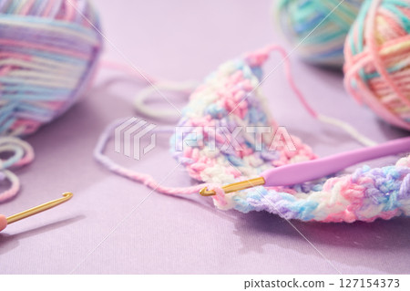 Image of crocheting with pastel colored yarn Image of crocheting with pastel colored yarn 127154373