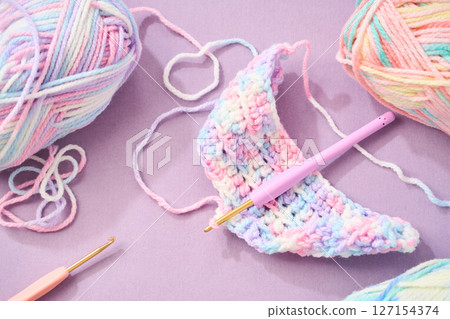 Image of crocheting with pastel colored yarn Image of crocheting with pastel colored yarn 127154374