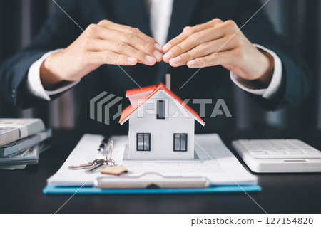Concept business house finance protection office plan investment buy sell home ensuring idea financial security. residence agent hand protect purchase insurance and secure favorable loan deal. Concept business house finance protection office plan investment buy sell home ensuring idea financial security. residence agent hand protect purchase insurance and secure favorable loan deal. 127154820