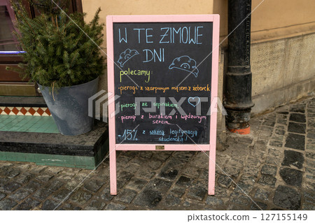 Winter Cafe Chalkboard Menu on Cobbled Street 127155149