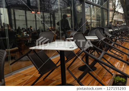 Closed Outdoor Cafe in Winter Weather 127155293