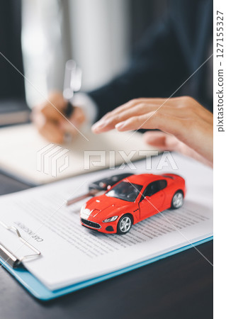 Concept business vehicle finance protection office plan investment buy sell car ensuring idea financial security. automobile agent hand protect purchase insurance and secure favorable loan deal. Concept business vehicle finance protection office plan investment buy sell car ensuring idea financial security. automobile agent hand protect purchase insurance and secure favorable loan deal. 127155327