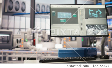 Display in industry 4.0 solar panels plant troubleshooting equipment malfunctions through IoT sensors. Monitor in smart photovoltaics factory alerting in case of maintenance need 127155677