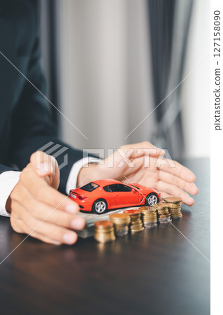 Concept business vehicle finance protection office plan investment buy sell car ensuring idea financial security. automobile agent hand protect purchase insurance and secure favorable loan deal. 127158090