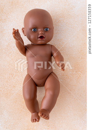Baby doll. Plastic toy Baby doll. Plastic toy 127158359