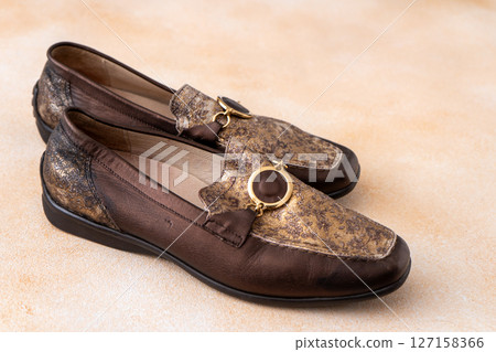 Pair of leather shoes. Brown classic moccasins. Loafers footwear. 127158366