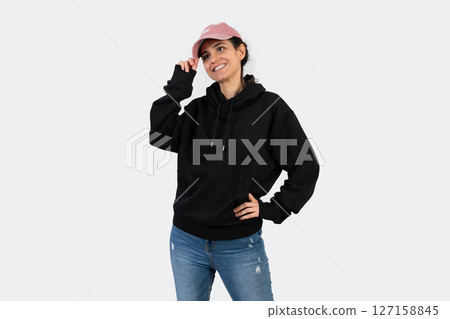 Mockup of a black hoodie on a woman with white background. 127158845