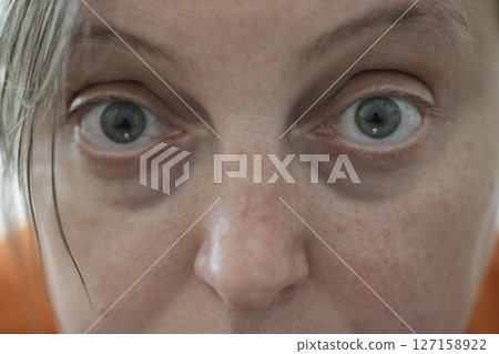 young woman's eyes 127158922