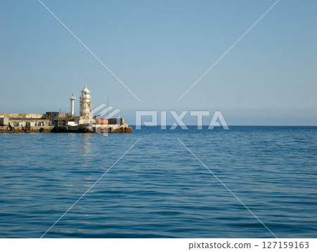Lighthouse on the Coastline at Sea Yalta Crimea 127159163