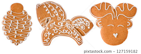 Gingerbread decorated with white sugar glaze isolated on white background. Christmas cookies. 127159182