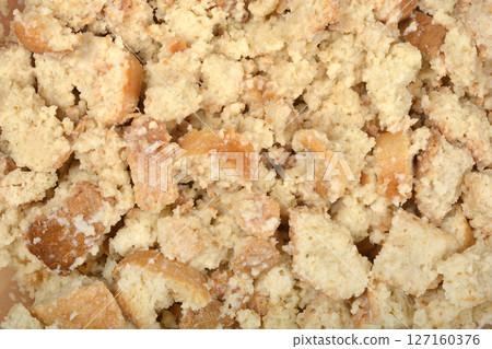 Moistened, crumbled stale bread Moistened, crumbled stale bread 127160376