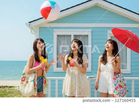Girls enjoying summer vacation at a seaside pension 127160455