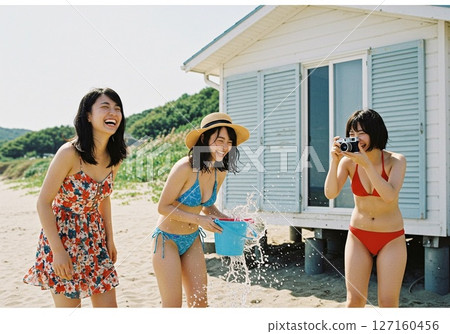 Girls enjoying summer vacation at a seaside pension 127160456